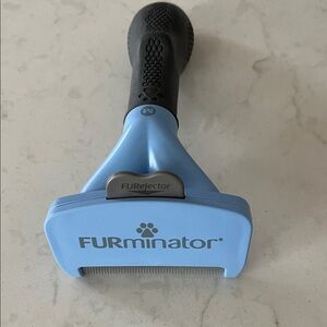 FURminator Undercoat DeShedding Tool for medium dog/long hair